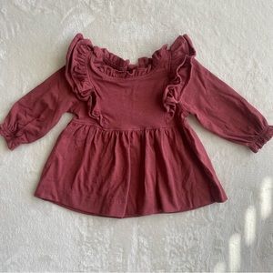 Kate Quinn ruffle top